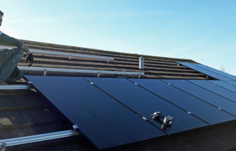 Solar panels being clamped to their rails (Image: T. Larkum)